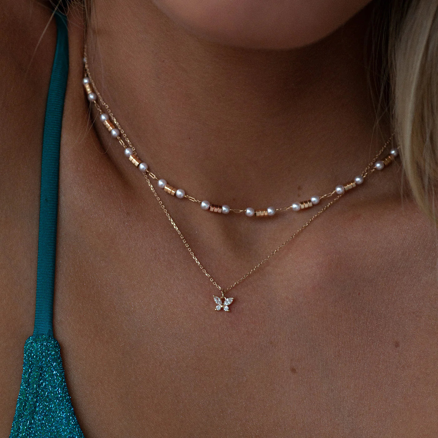 halsband med fjäril från timi of sweden